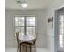 Eat-in dining area features large windows and a chandelier style light fixture at 571 Oak Vista Ct, Lawrenceville, GA 30044