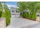 Charming two-story home with a two-car garage, well-maintained lawn, and mature trees at 571 Oak Vista Ct, Lawrenceville, GA 30044