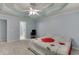Spacious main bedroom with tray ceiling and ensuite access at 571 Oak Vista Ct, Lawrenceville, GA 30044