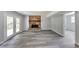 Finished basement featuring wood floors, a stone fireplace and french doors at 6906 Shangrila Way, Riverdale, GA 30296
