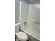 Bathroom with toilet and shower tub at 6906 Shangrila Way, Riverdale, GA 30296