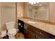 Bathroom features granite countertops, dark wood vanity, and tile floors at 3481 Lakeside Ne Dr # 902, Atlanta, GA 30326