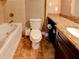 Bathroom features granite countertops, tile floors, and jacuzzi tub at 3481 Lakeside Ne Dr # 902, Atlanta, GA 30326