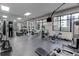 Fully equipped fitness center with state-of-the-art machines and mirrored walls for a comprehensive workout experience at 3481 Lakeside Ne Dr # 902, Atlanta, GA 30326