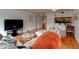 Inviting living room features hardwood floors and an open floorplan to the kitchen area at 3481 Lakeside Ne Dr # 902, Atlanta, GA 30326