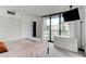 Bright main bedroom with large window and built in dresser at 3481 Lakeside Ne Dr # 902, Atlanta, GA 30326