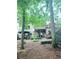 View of the backyard featuring a patio and deck with outdoor seating at 3930 Regal Oaks Dr, Suwanee, GA 30024