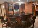 Finished basement bar area with seating and a view into the Gathering room at 3930 Regal Oaks Dr, Suwanee, GA 30024