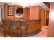 Finished basement features a stylish bar area, TV, and seating at 3930 Regal Oaks Dr, Suwanee, GA 30024