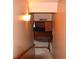 Stairs lead down to a finished basement with a custom bar at 3930 Regal Oaks Dr, Suwanee, GA 30024