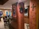Basement with a wet bar, Auburn sports decor, and a stylish entertainment area at 3930 Regal Oaks Dr, Suwanee, GA 30024
