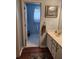 Bright bathroom features a tiled floor, single vanity with ample lighting, and convenient layout at 3930 Regal Oaks Dr, Suwanee, GA 30024