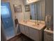 Bathroom featuring double sinks and a view into the toilet room at 3930 Regal Oaks Dr, Suwanee, GA 30024