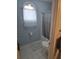 Full bathroom with a shower-tub combo, decorative towels, and blue walls at 3930 Regal Oaks Dr, Suwanee, GA 30024