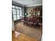 Traditional dining room with chandelier and china cabinet at 3930 Regal Oaks Dr, Suwanee, GA 30024