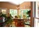 Dining room with natural light, hardwood floors, and stylish decor at 3930 Regal Oaks Dr, Suwanee, GA 30024