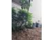 Home exterior featuring air conditioning units and natural landscaping at 3930 Regal Oaks Dr, Suwanee, GA 30024