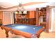 Spacious finished basement game room with pool table and recessed lighting at 3930 Regal Oaks Dr, Suwanee, GA 30024