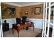 Comfortable home office with a traditional desk and stylish decor at 3930 Regal Oaks Dr, Suwanee, GA 30024