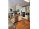 This kitchen features granite countertops, stainless steel appliances, and hardwood floors at 3930 Regal Oaks Dr, Suwanee, GA 30024