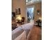 Spacious living room showing lots of natural light, and comfortable seating at 3930 Regal Oaks Dr, Suwanee, GA 30024
