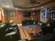Spacious finished basement living room with TV, lighting, and Auburn decor at 3930 Regal Oaks Dr, Suwanee, GA 30024