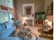 Spacious living room with fireplace, large windows, and comfortable seating at 3930 Regal Oaks Dr, Suwanee, GA 30024