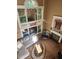 Bright living room featuring lots of natural light, plush seating, and a cozy fireplace at 3930 Regal Oaks Dr, Suwanee, GA 30024
