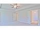 A large bedroom showcases ample space and neutral carpeting at 1436 Weeping Tree Dr, Auburn, GA 30011