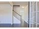 Inviting entryway featuring hardwood floors and staircase, creating a warm and welcoming ambiance at 1436 Weeping Tree Dr, Auburn, GA 30011