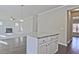 An open-concept living area showcases hardwood floors and a fireplace at 1436 Weeping Tree Dr, Auburn, GA 30011