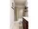 Cozy bathroom with a shower-tub combo featuring a floral-patterned shower curtain at 2099 Lakeview Bend Way, Buford, GA 30519