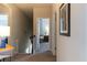Hallway leading to other rooms, featuring modern lighting and neutral décor at 2099 Lakeview Bend Way, Buford, GA 30519