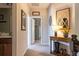 Bright hallway adorned with rustic decor and modern accents, creating a charming and welcoming transition space at 2099 Lakeview Bend Way, Buford, GA 30519