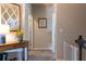 Warm and inviting hallway featuring stylish decor, neutral tones, and ample natural light at 2099 Lakeview Bend Way, Buford, GA 30519