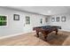 Basement recreation area with a pool table and exterior door at 3581 Ridge Se Rd, Smyrna, GA 30080