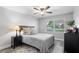 Cozy bedroom with natural light, a ceiling fan, and a neutral color palette at 3581 Ridge Se Rd, Smyrna, GA 30080