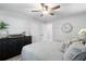 Bedroom featuring a bed with pillows and a black dresser with decorations at 3581 Ridge Se Rd, Smyrna, GA 30080