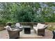 Relaxing outdoor deck with comfortable seating and a fire pit at 3581 Ridge Se Rd, Smyrna, GA 30080