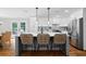 Beautiful kitchen island with pendant lighting and seating, part of an open-concept design at 3581 Ridge Se Rd, Smyrna, GA 30080