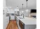 Gorgeous kitchen island with seating, stainless steel appliances, and modern design at 3581 Ridge Se Rd, Smyrna, GA 30080