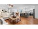 Bright and spacious open-concept living area with hardwood floors flowing into the kitchen and dining space at 3581 Ridge Se Rd, Smyrna, GA 30080