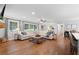 Expansive living area showing seamless flow to the kitchen and dining area at 3581 Ridge Se Rd, Smyrna, GA 30080