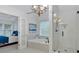 Modern bathroom featuring glass shower, soaking tub, and chandelier at 3957 Marquette Nw Way, Kennesaw, GA 30144