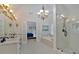 Spacious bathroom with double vanity, bathtub and glass shower at 3957 Marquette Nw Way, Kennesaw, GA 30144