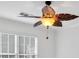 Bedroom with a light fixture and a ceiling fan with leaf-shaped blades at 3957 Marquette Nw Way, Kennesaw, GA 30144