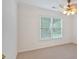 Bedroom with large window and fan with light fixture at 3957 Marquette Nw Way, Kennesaw, GA 30144