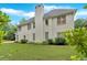 Back exterior view of a light-colored two-story home with a chimney at 3957 Marquette Nw Way, Kennesaw, GA 30144