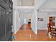 Spacious foyer with hardwood floors, showcasing a view into the living room and dining area at 3957 Marquette Nw Way, Kennesaw, GA 30144