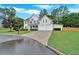 Attractive two-story house with a manicured lawn, double garage, and welcoming front entrance at 3957 Marquette Nw Way, Kennesaw, GA 30144
